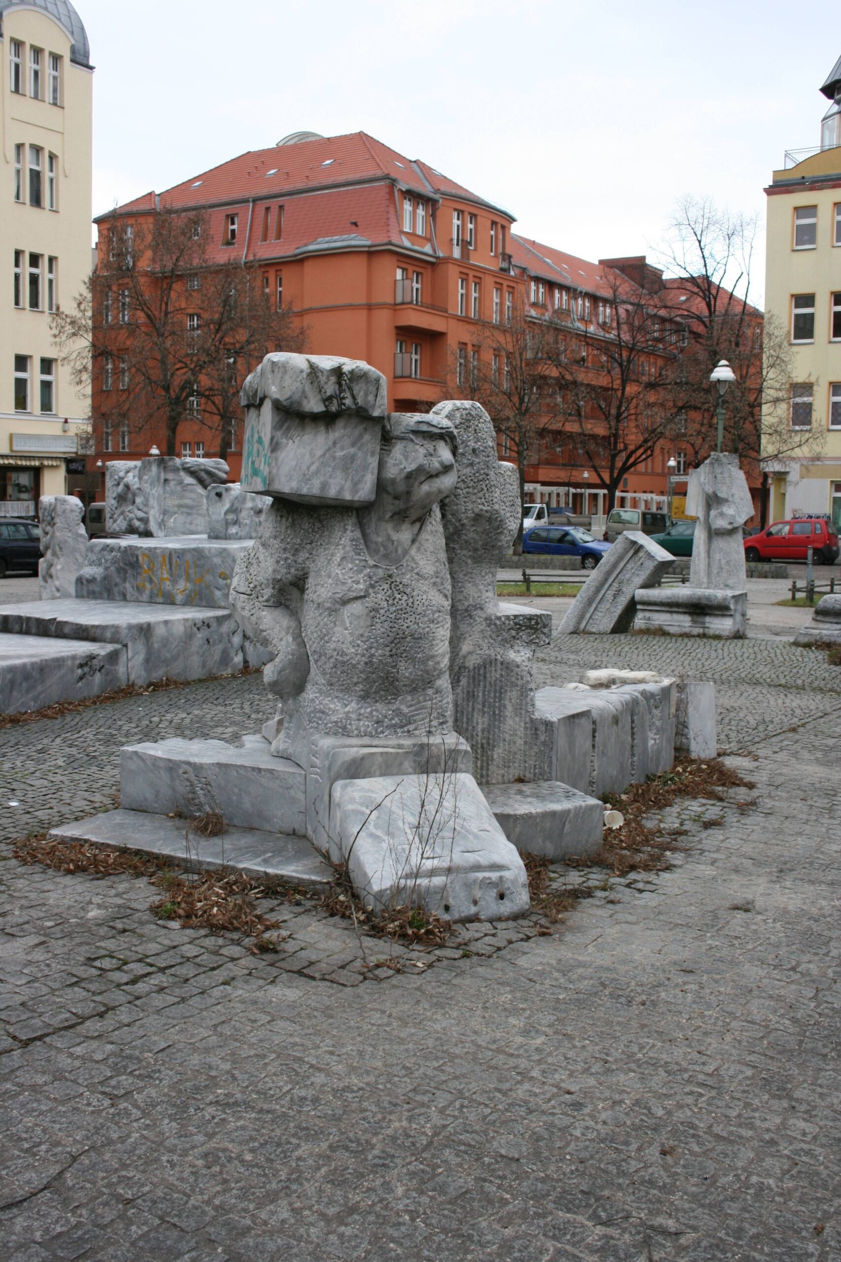 Mehmet Aksoy’s carved marble figures and geometric blocks at Kranoldplatz in Berlin.